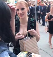 That pen really suits Jessica Chastain's cleavage