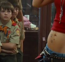 Olivia wilde showing some Treats for a room full of cub scouts