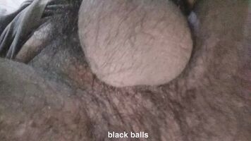 watch my black cock and balls. rate it please