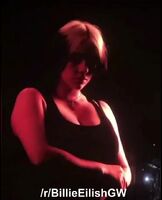 Billie Eilish puts her massive tits on display