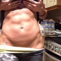 abs are flexed in the kitchen
