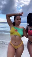 Caribbean Women with their country flags painted on them