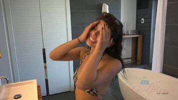 Gina showering and being adorable after a morning of snorkeling