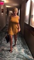 Busty Blonde Removes Dress In Hotel Hallway