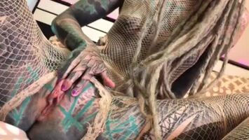Tattoos, anal sex and a fishnet catsuit fit perfect together. It makes me so horny... You too ?