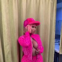 Nicki Minaj is begging us to look at her cleavage in this outfit